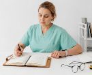Healthcare specialist reviewing documents